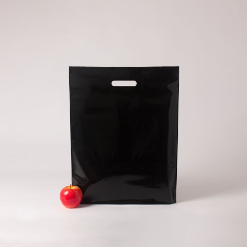 Полиэтиленовые пакеты 40х50х4см, цвет - черный, материал - полиэтилен, ламинация - без ламинации, ручки - прорубные, фото 1 (вид спереди)